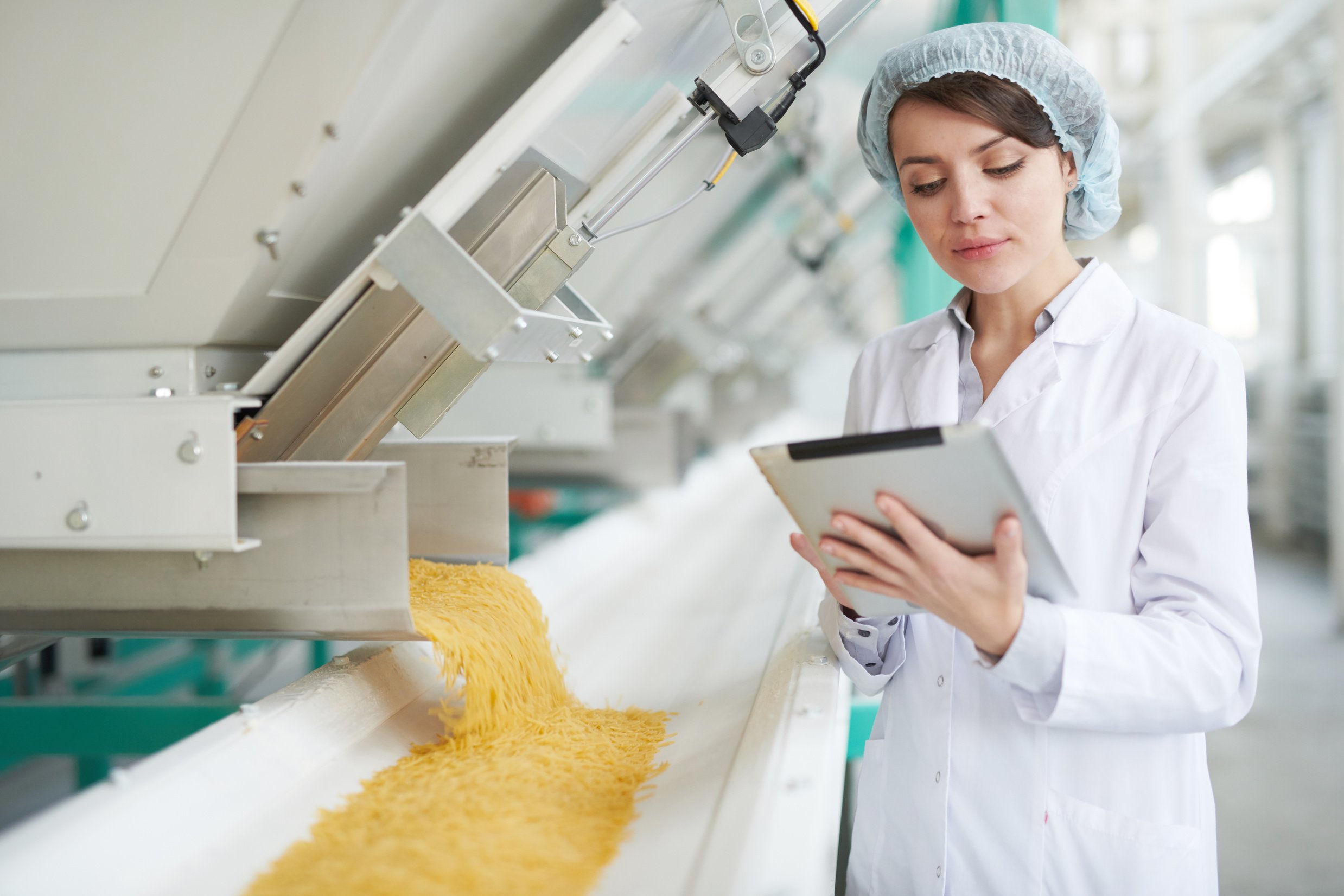 Young Woman at Food Factory